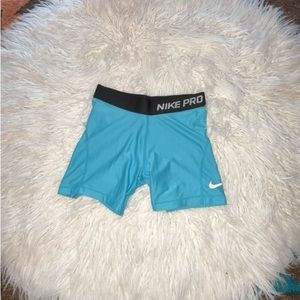 Teal Nike Pro’s* size medium, great for workout, 3”